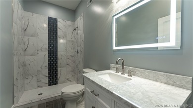 Experience Open Space Luxury lakefront living in this custom - photo 26