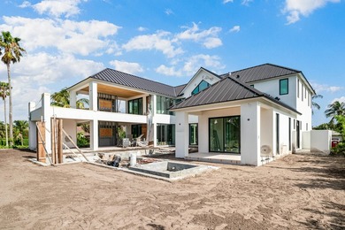 Discover the Pinnacle of Coastal Luxury with this Brand-New Home - photo 32