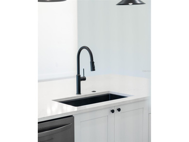 Welcome to this modern, custom-built home perfectly situated on