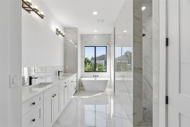 Welcome to this modern, custom-built home perfectly situated on