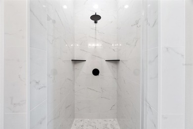 Welcome to this modern, custom-built home perfectly situated on