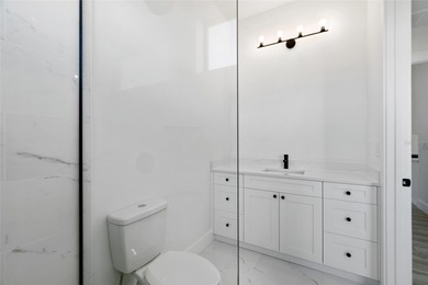 Welcome to this modern, custom-built home perfectly situated on