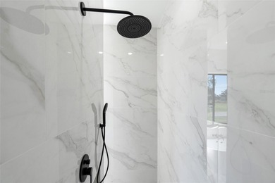 Welcome to this modern, custom-built home perfectly situated on