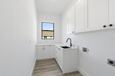 Welcome to this modern, custom-built home perfectly situated on