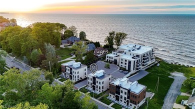 Nestled along the shores of Lake Erie in the exclusive 700 Lake - photo 4