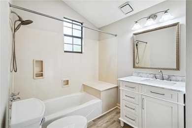 Priced to sell & nestled within the gates of Beau Chene, this - photo 12
