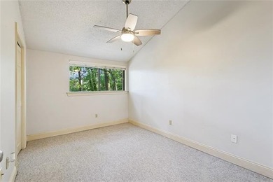 Priced to sell & nestled within the gates of Beau Chene, this - photo 13