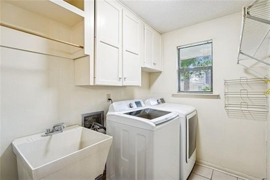 Priced to sell & nestled within the gates of Beau Chene, this - photo 15