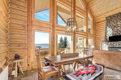Perched on a half-acre of pristine land, this full-log retreat - photo 10