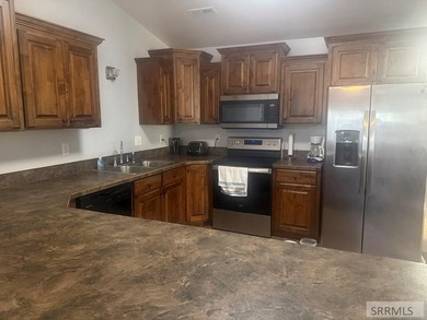This charming 3-bedroom, 2-bathroom twin home is located in the - photo 9