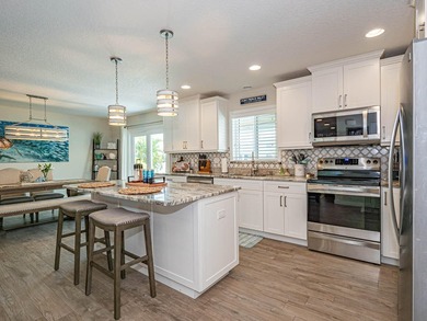 Welcome to this waterfront single-story residence in Coral Cove - photo 14