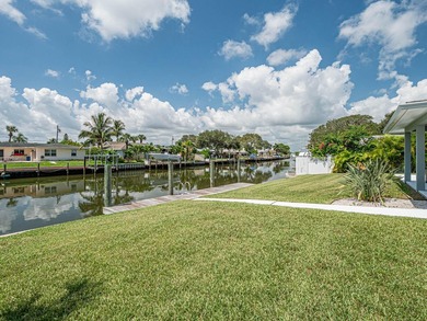 Welcome to this waterfront single-story residence in Coral Cove - photo 19