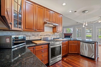 Beautiful residence set on a wooded homesite with mature oak and - photo 24