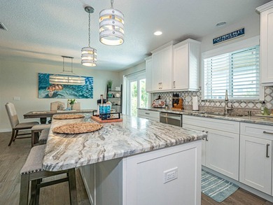 Welcome to this waterfront single-story residence in Coral Cove - photo 31
