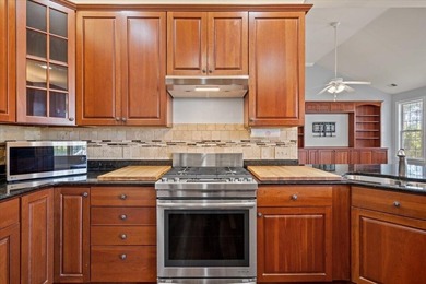Beautiful residence set on a wooded homesite with mature oak and - photo 40