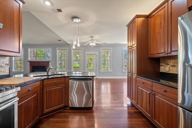 Beautiful residence set on a wooded homesite with mature oak and - photo 48