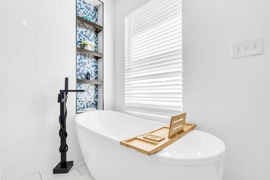 Nestled in one of the most lush and coveted locations along - photo 50