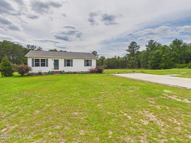 Welcome to this charming 3-bedroom, 2-bath home nestled on 2.5 - photo 2