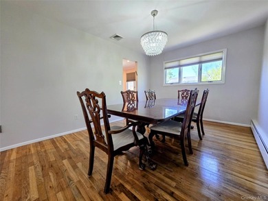 Spacious hi ranch with 4 bedrooms and 3 full bathrooms, set on - photo 5