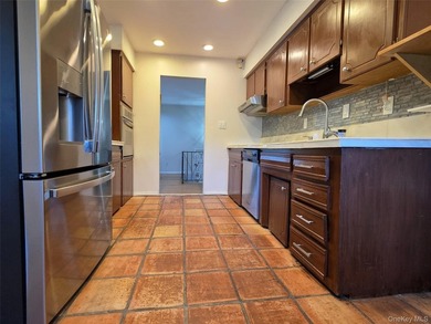 Spacious hi ranch with 4 bedrooms and 3 full bathrooms, set on - photo 6