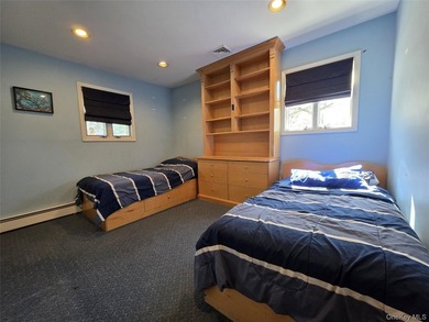 Spacious hi ranch with 4 bedrooms and 3 full bathrooms, set on - photo 10