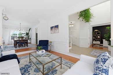 Experience refined living in this exceptional center hall - photo 11