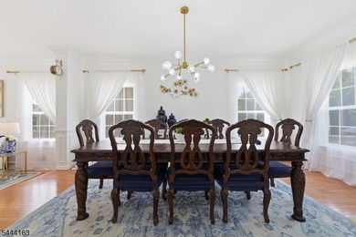 Experience refined living in this exceptional center hall - photo 12