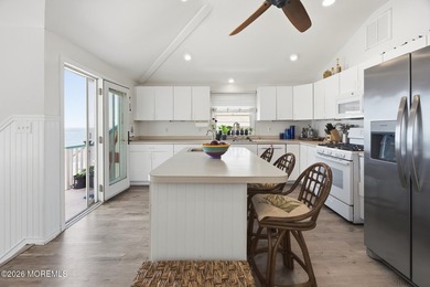 Experience elevated bayfront living in this exceptional - photo 12