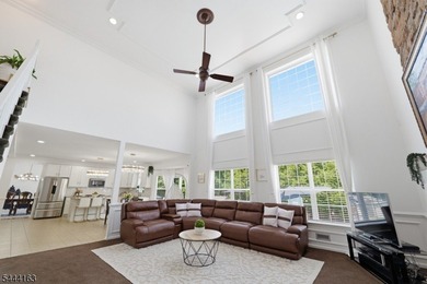 Experience refined living in this exceptional center hall - photo 15