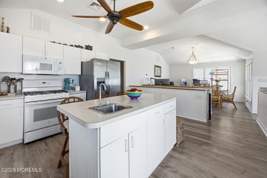 Experience elevated bayfront living in this exceptional - photo 15