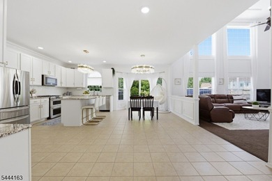 Experience refined living in this exceptional center hall - photo 16