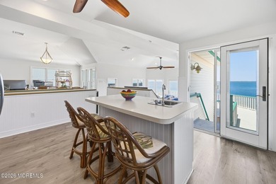 Experience elevated bayfront living in this exceptional - photo 16