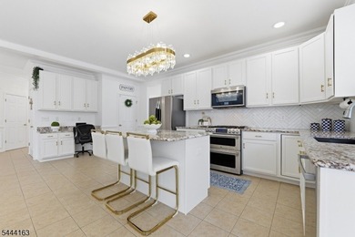 Experience refined living in this exceptional center hall - photo 17