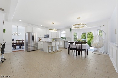 Experience refined living in this exceptional center hall - photo 19