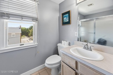 Experience elevated bayfront living in this exceptional - photo 19