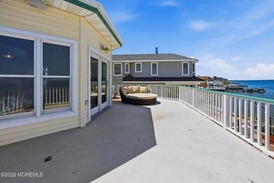 Experience elevated bayfront living in this exceptional - photo 20