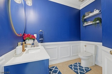 Experience refined living in this exceptional center hall - photo 21