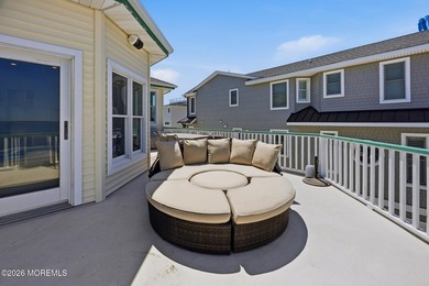 Experience elevated bayfront living in this exceptional - photo 21