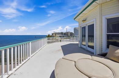 Experience elevated bayfront living in this exceptional - photo 22