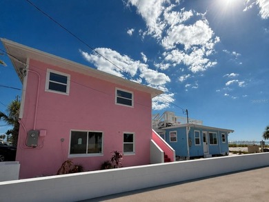 Own one of Treasure Island's rarest beachfront compounds - photo 2