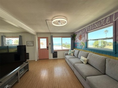 Own one of Treasure Island's rarest beachfront compounds - photo 7