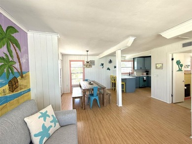 Own one of Treasure Island's rarest beachfront compounds - photo 10