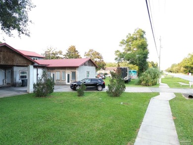 A One-of-a-Kind Opportunity! Offered near land value and zoned - photo 3