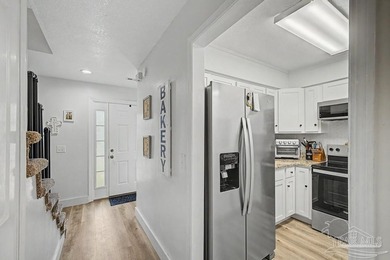 Move-in ready end-unit townhome featuring 2 bedrooms, 1.5 - photo 4
