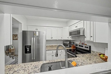 Move-in ready end-unit townhome featuring 2 bedrooms, 1.5 - photo 5