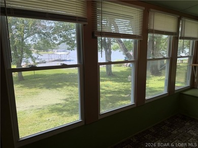 Rare 4-Lot Lakefront Property;Bonus Dock Lot Embrace this - photo 14