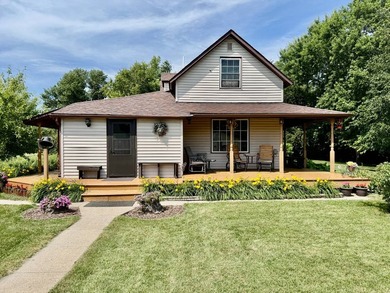 Charming 2 bedroom, 1.5 bath farmhouse on 7.2 acres combines