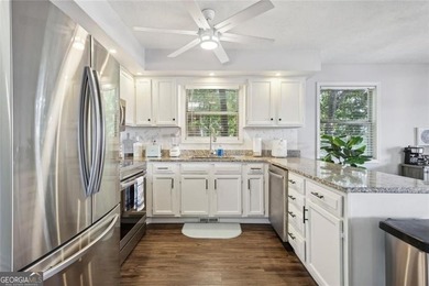 Experience lake living at its finest in this beautifully - photo 8