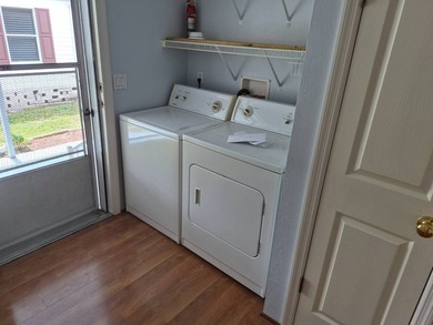 Free Golf Anyone?? This nice double wide home offers 2 bedrooms - photo 6