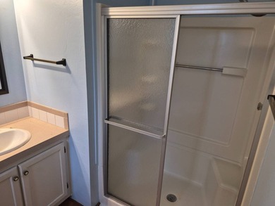 Free Golf Anyone?? This nice double wide home offers 2 bedrooms - photo 10